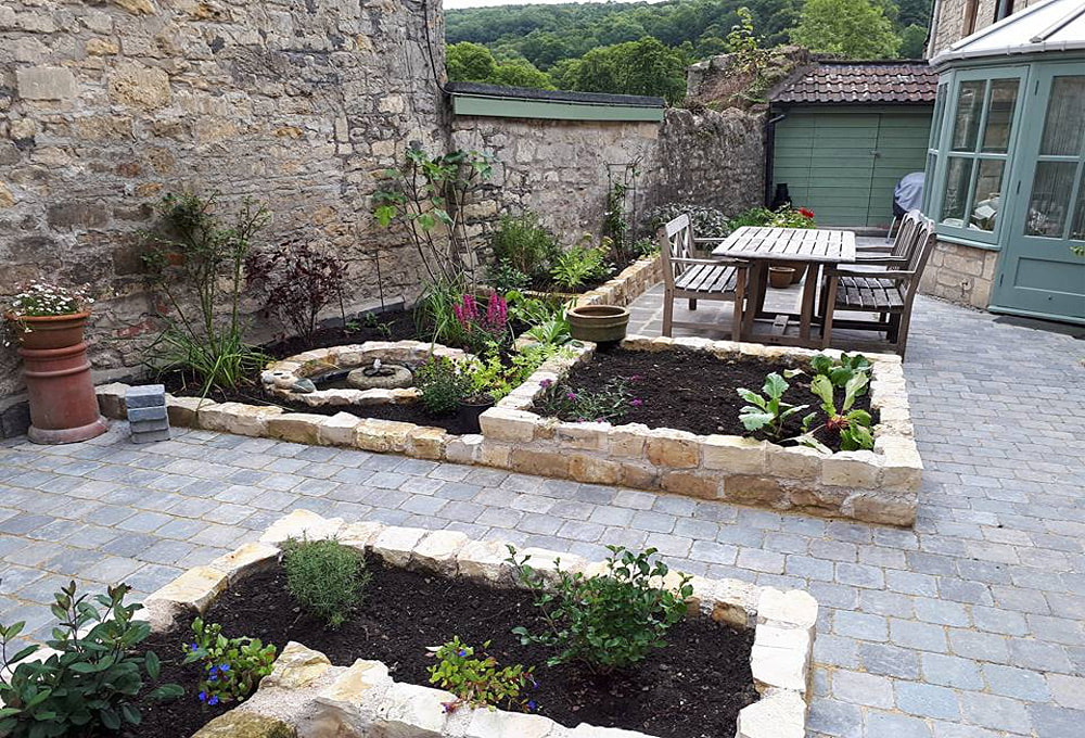 paved garden with patio area